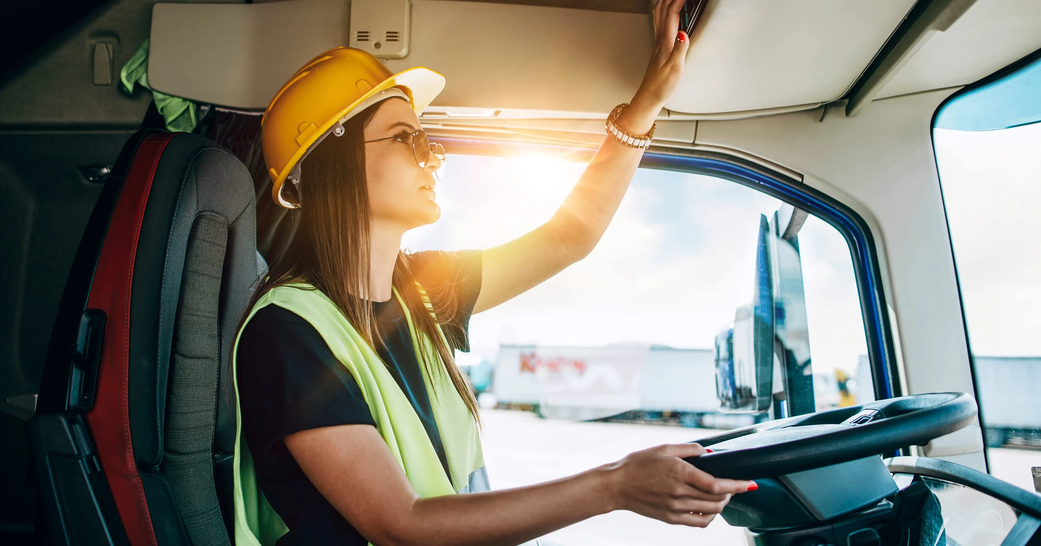 Amazon Freight Partners driver performing a vehicle inspection from the cab of the truck